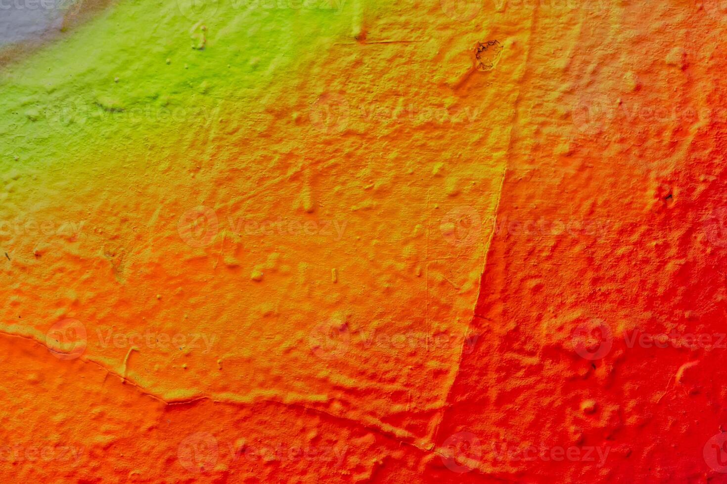 Fragment of colored graffiti painted on a wall. photo
