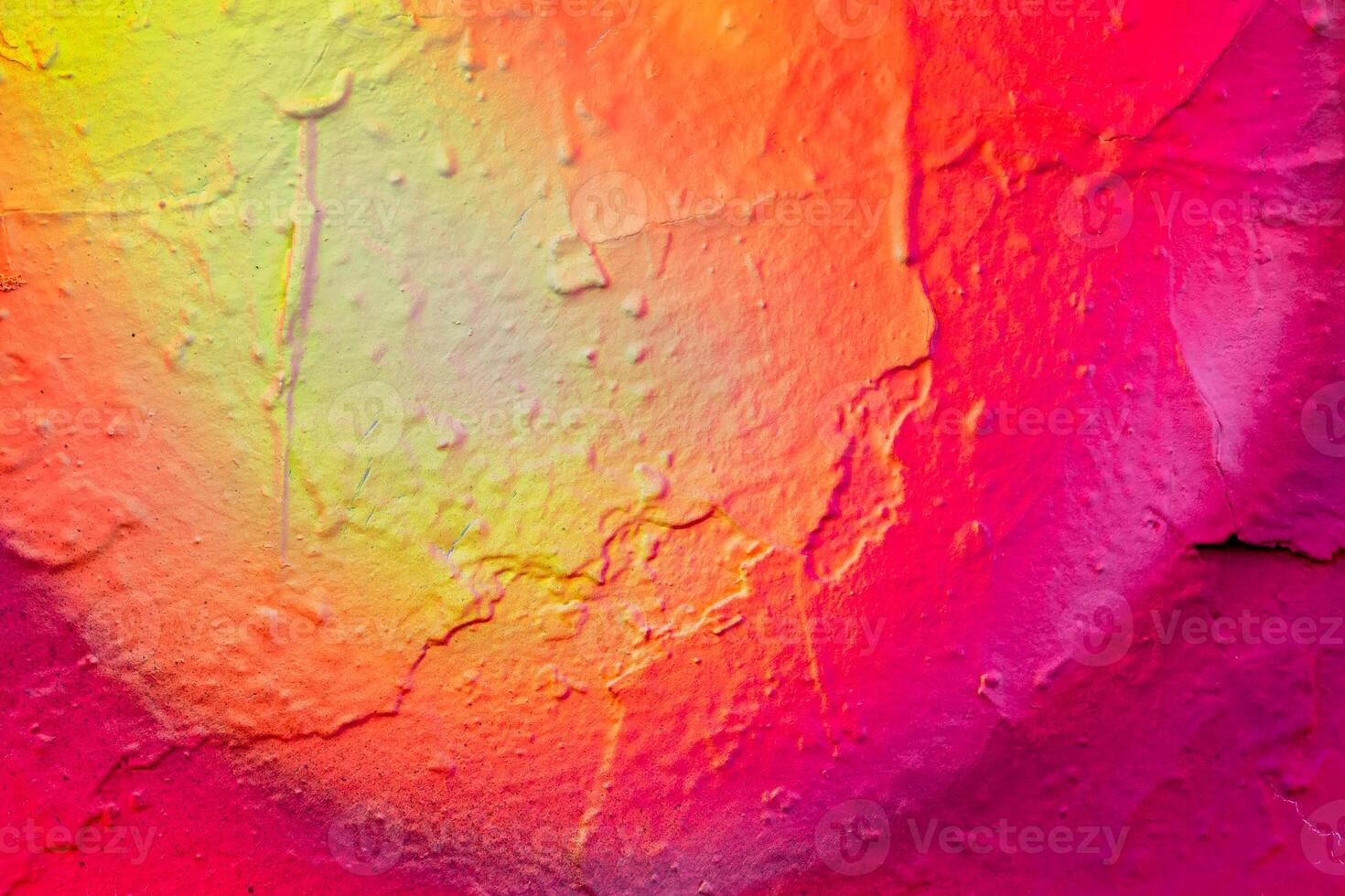 Fragment of colored graffiti painted on a wall. photo