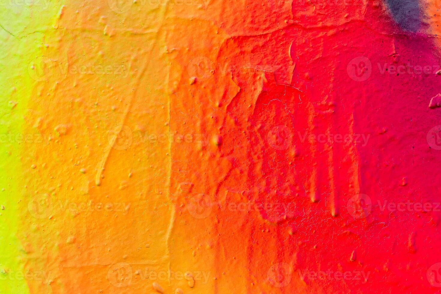 Fragment of colored graffiti painted on a wall. photo