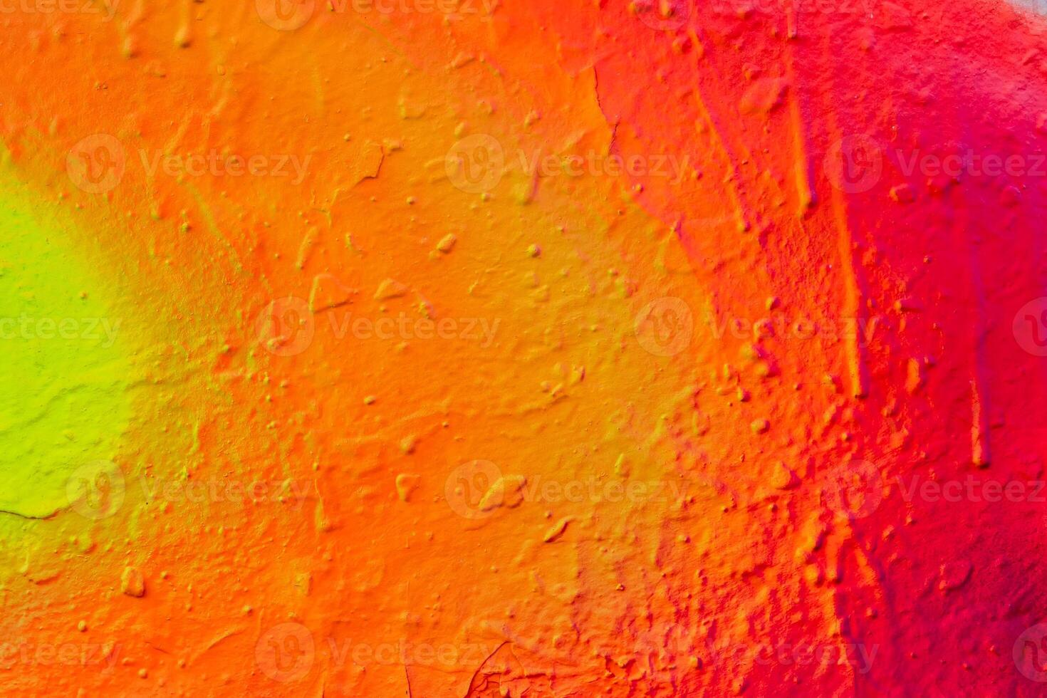 Fragment of bright graffiti painted on a wall. photo