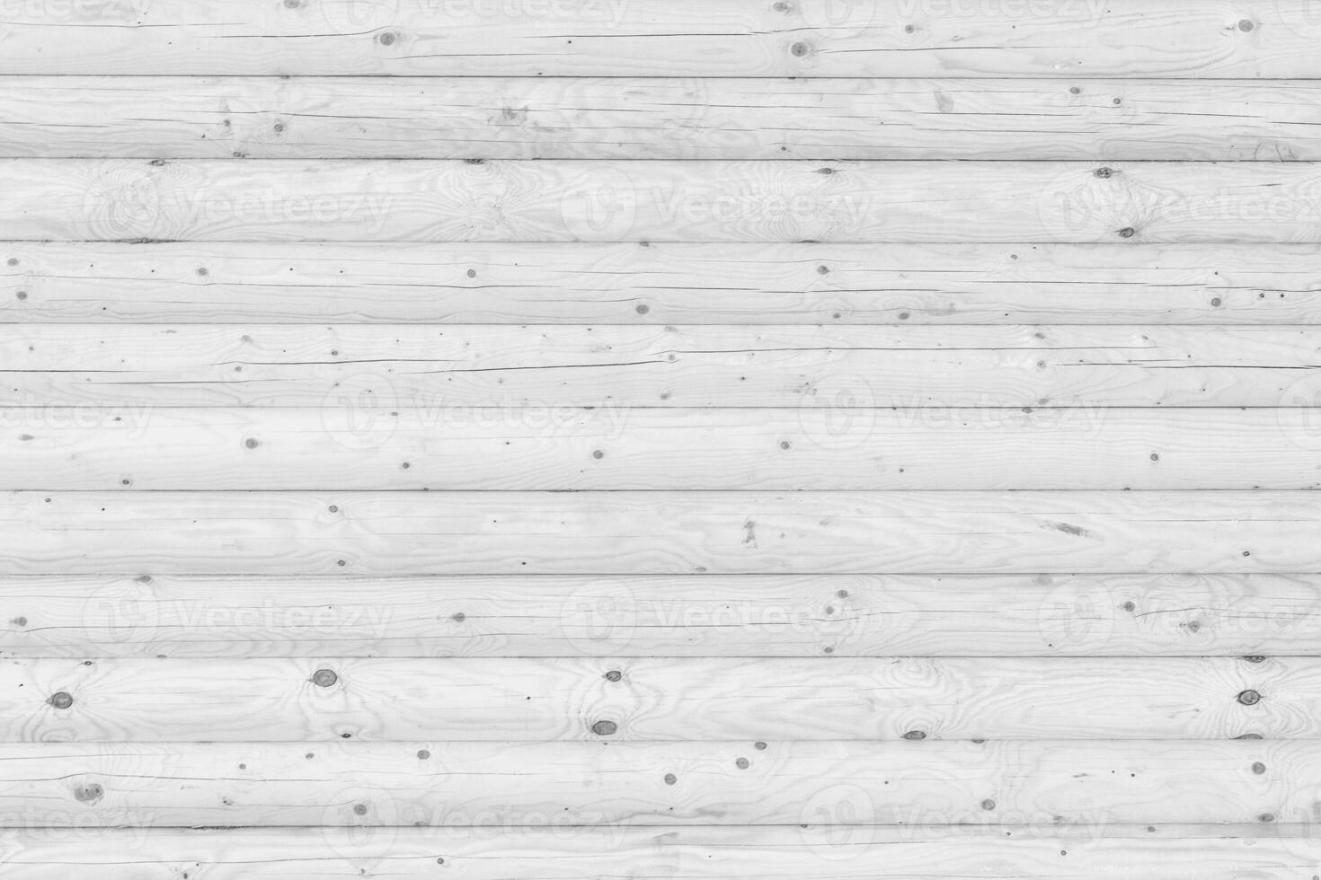 Wooden wall from logs as a background photo