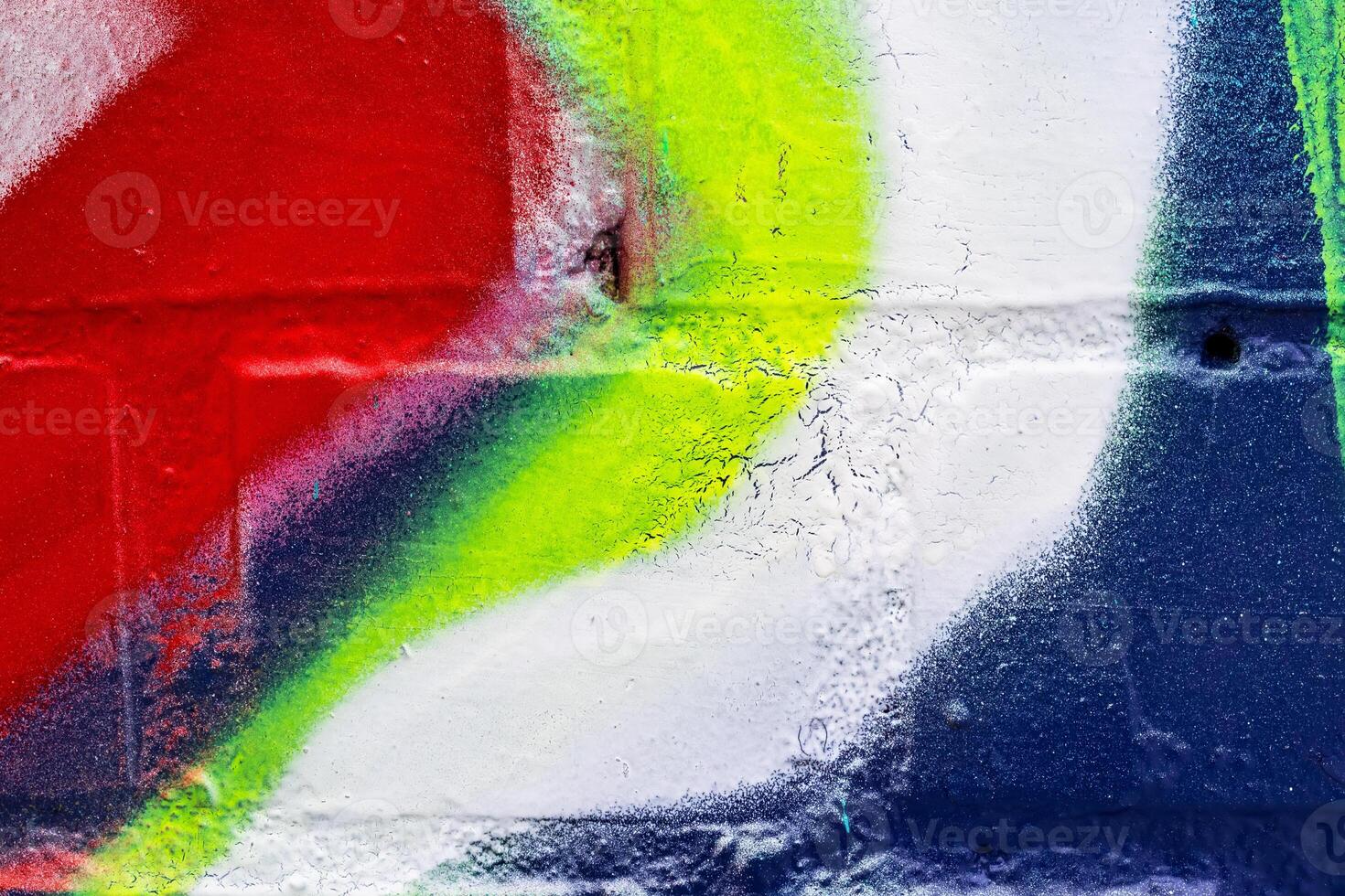 Graffiti painted on a brick wall texture. photo