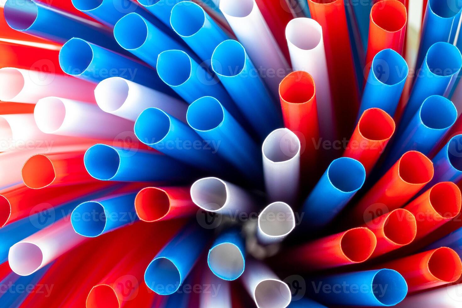 Colored drinking straws, top view. photo