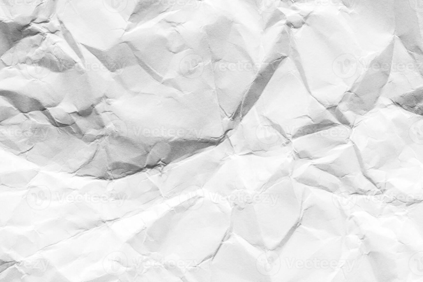 Crumpled white paper texture. Abstract background for design. photo