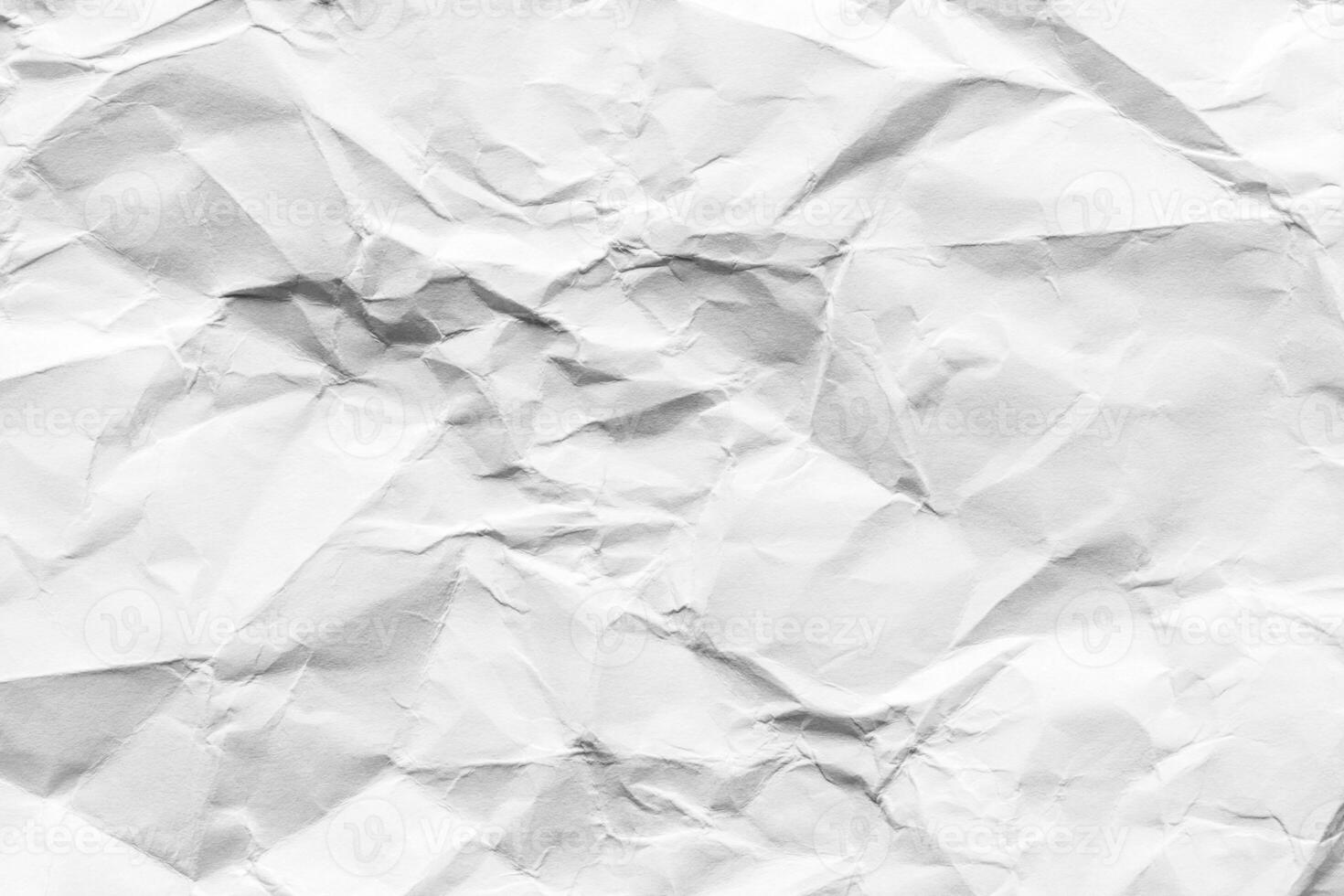 Crumpled white paper texture. Abstract background for design. photo