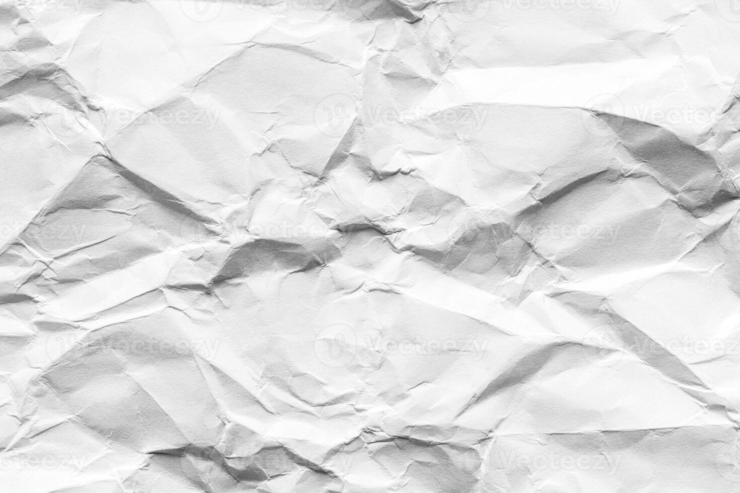 Crumpled white paper texture. Abstract background for design. photo