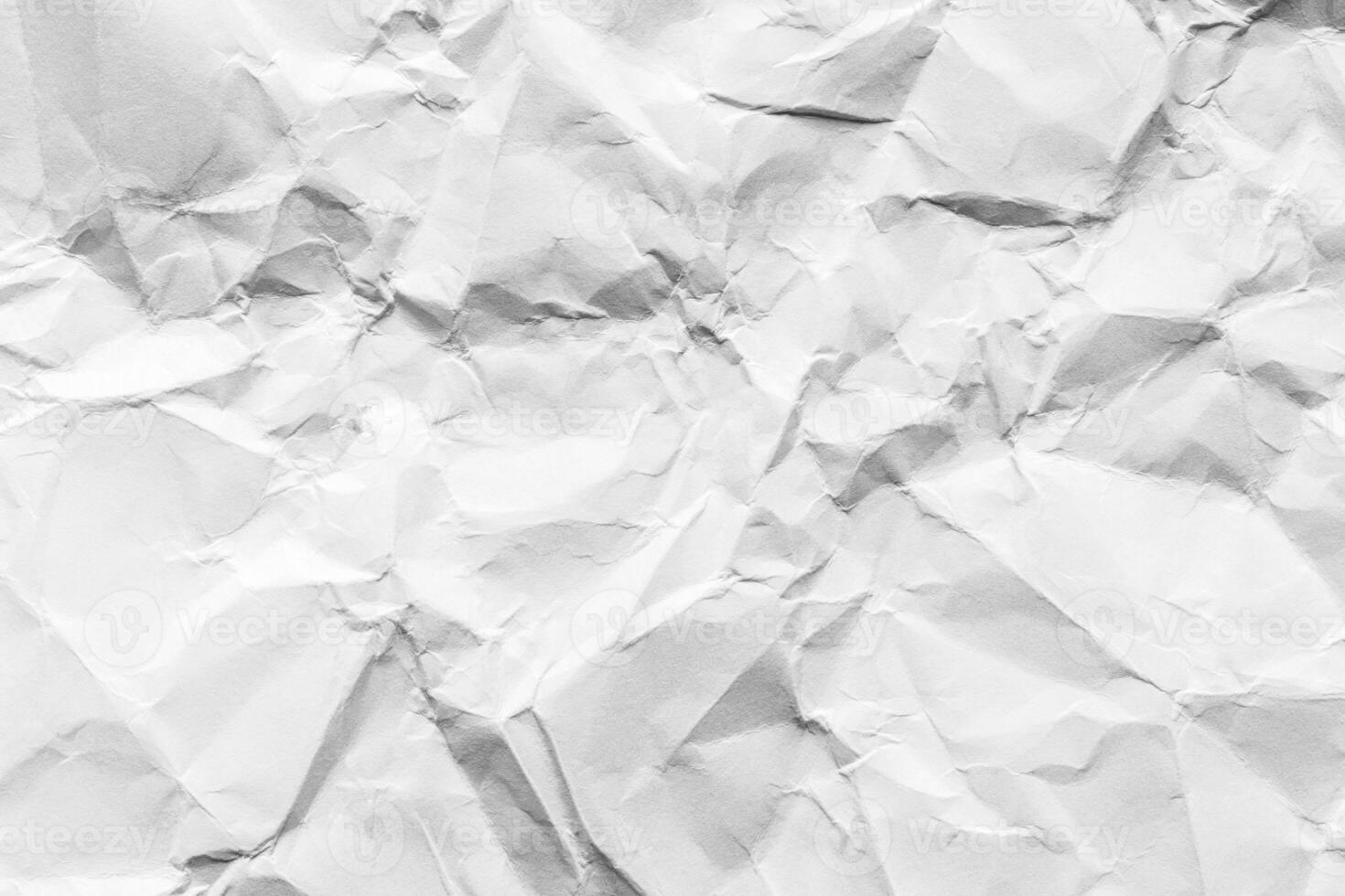 Crumpled white paper texture. Abstract background for design. photo