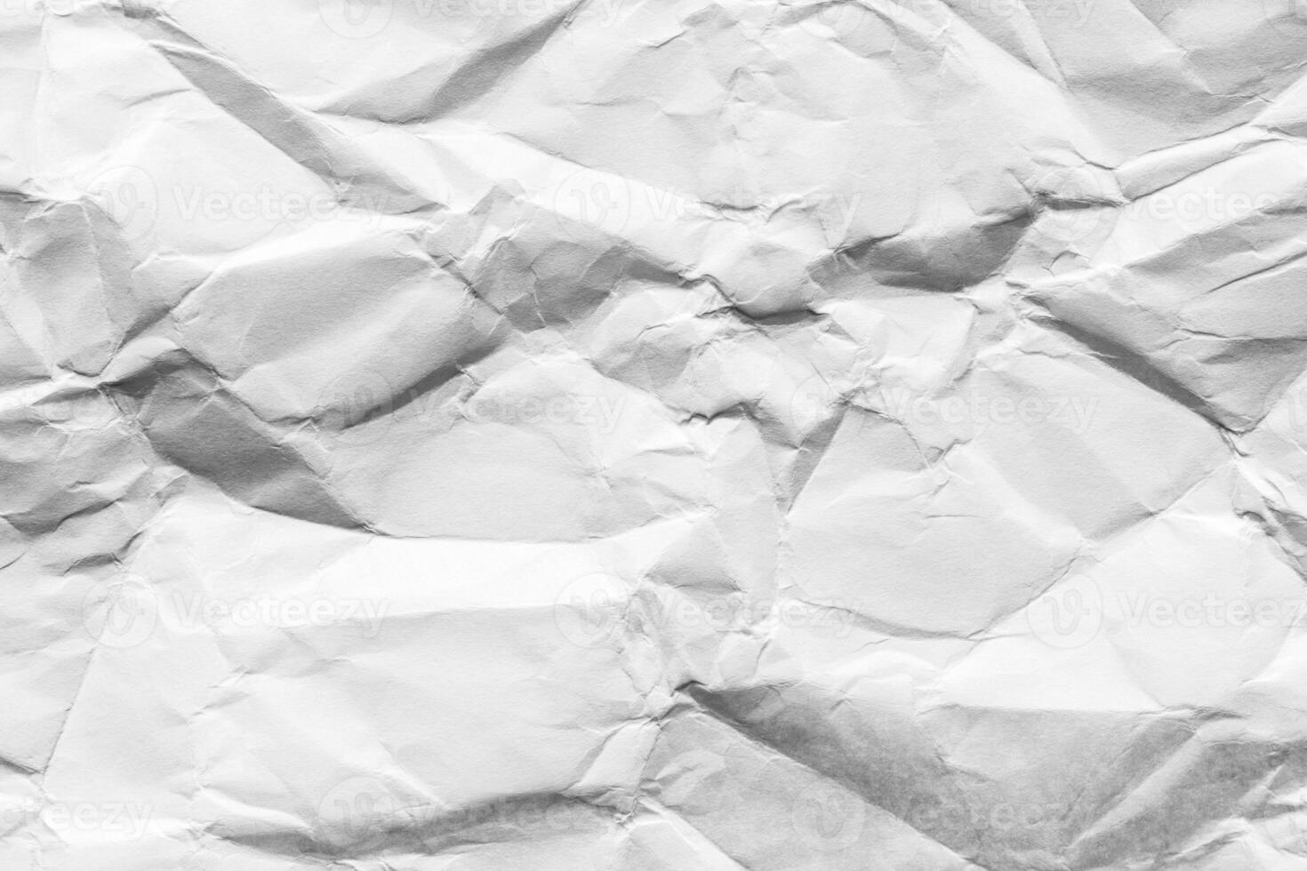 Crumpled white paper texture. Abstract background for design. photo