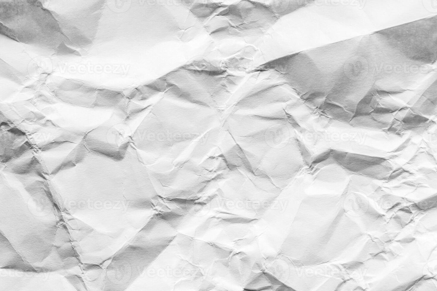 Crumpled white paper texture. Abstract background for design. photo