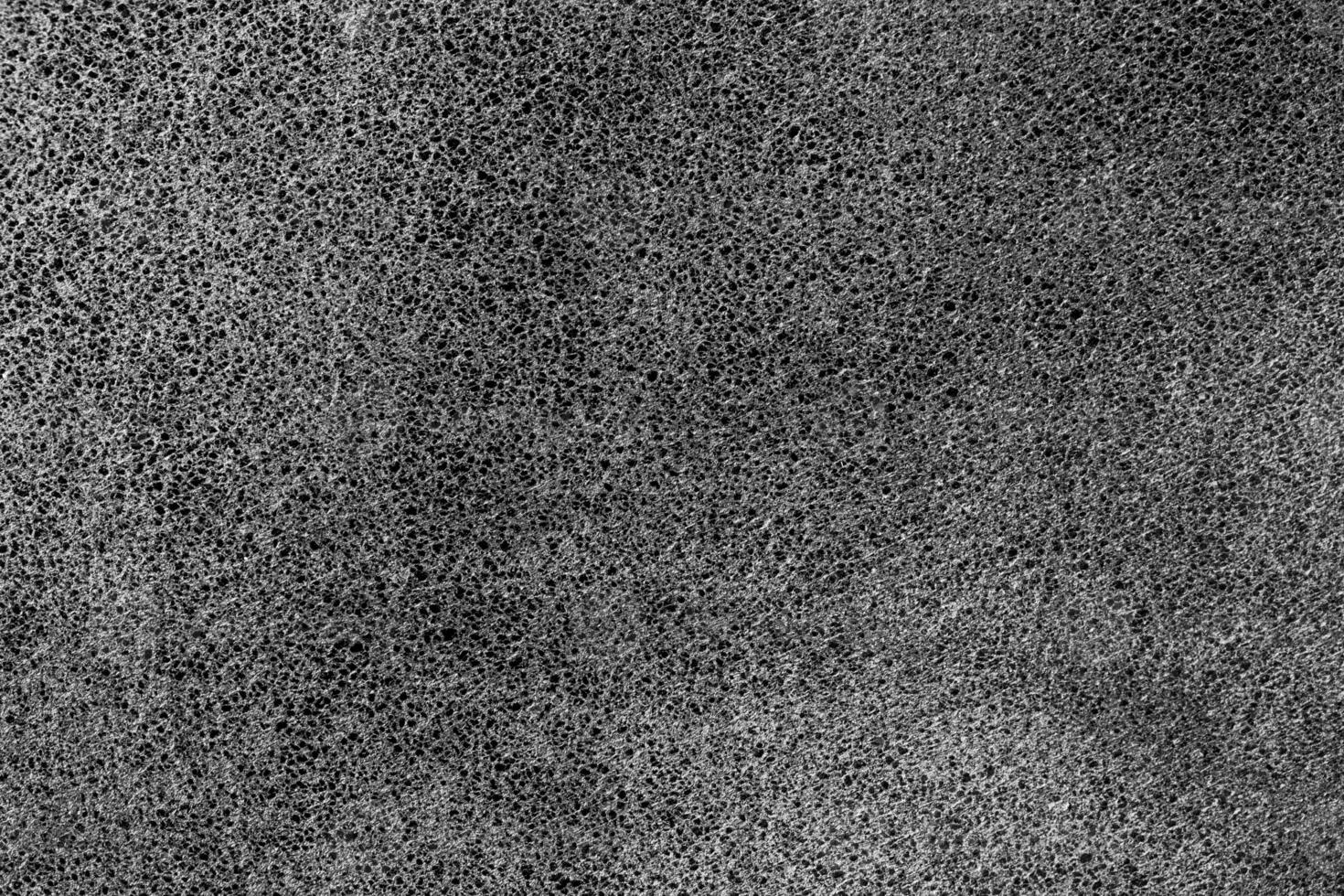 Black natural leather texture. Abstract background for design. photo
