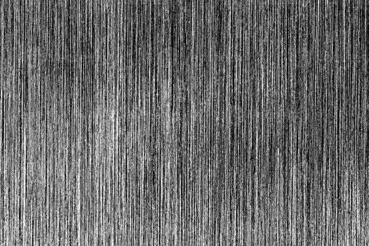 Metal texture with white scratches. Abstract noise black background overlay for design. photo