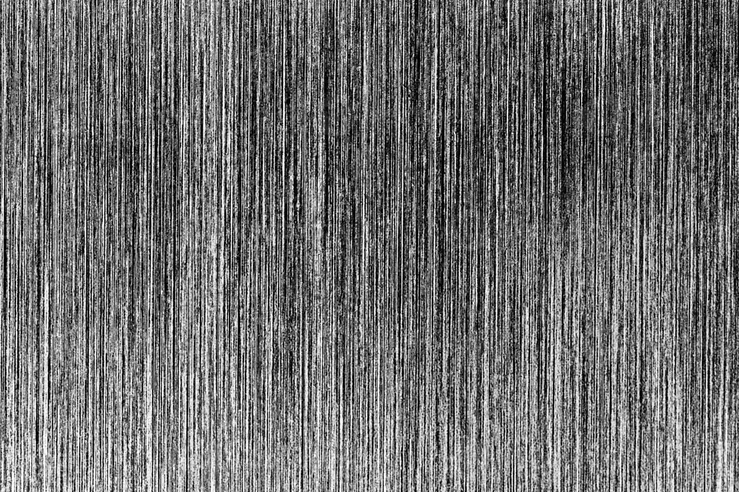 Metal texture with white scratches. Abstract noise black background overlay for design. photo