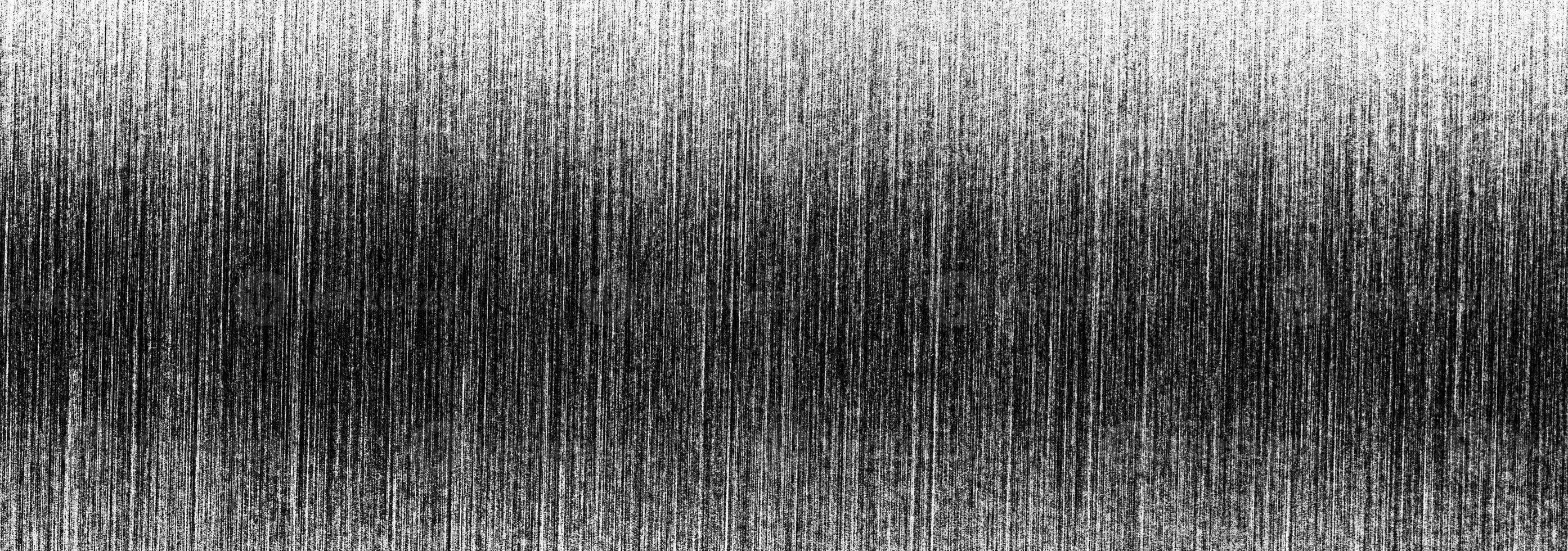 Metal texture with white scratches. Abstract noise black background overlay for design. photo