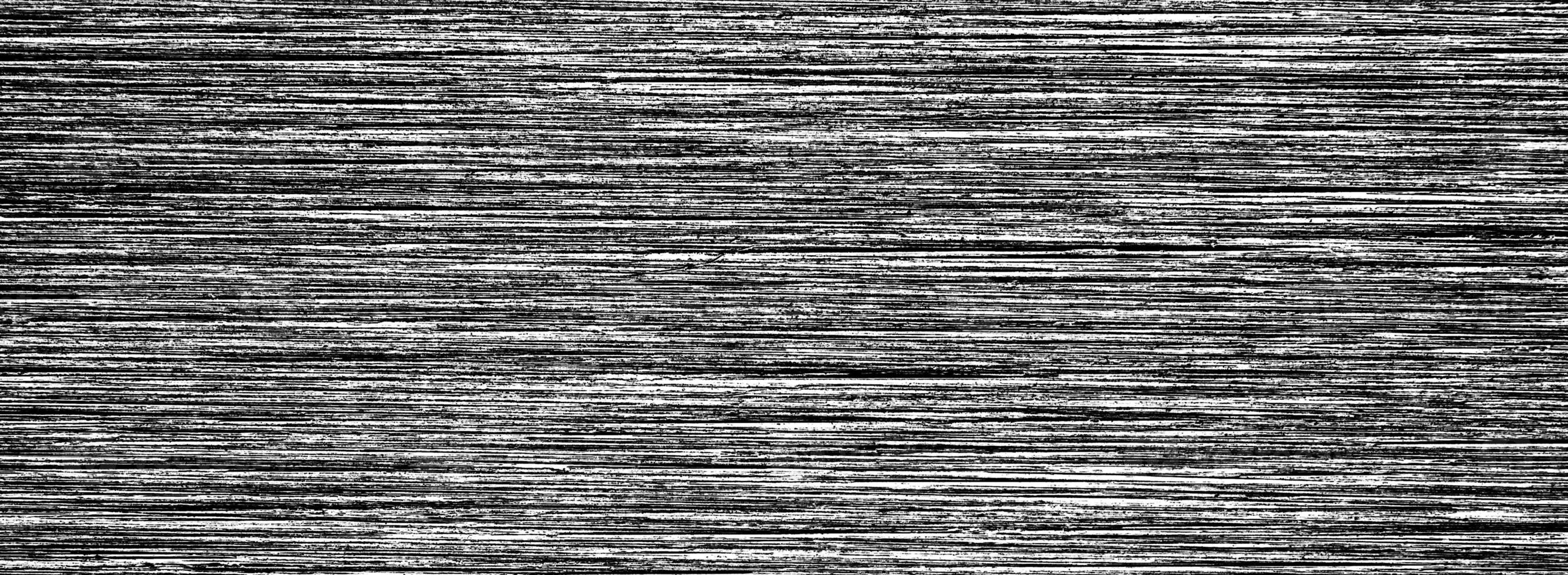 Metal texture with white scratches. Abstract noise black background overlay for design. photo