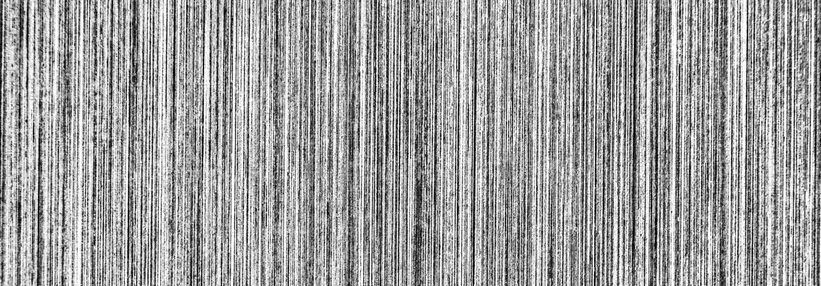 Metal texture with white scratches. Abstract noise black background overlay for design. photo