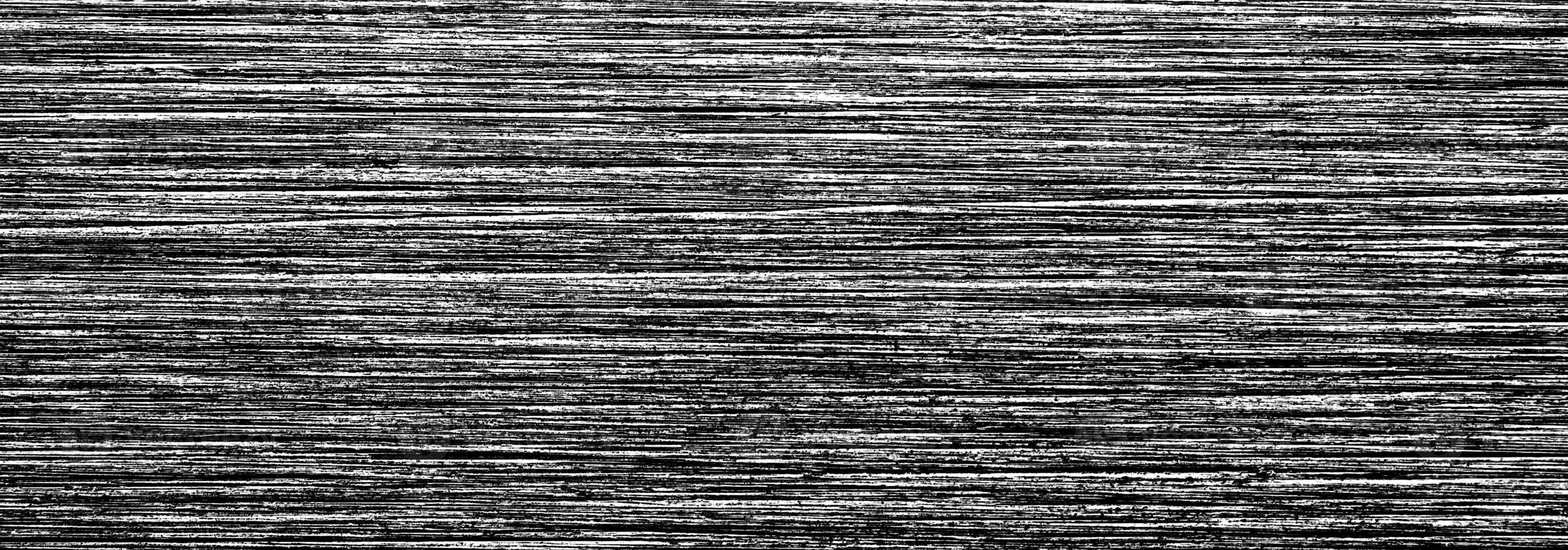 Metal texture with white scratches. Abstract noise black background overlay for design. photo