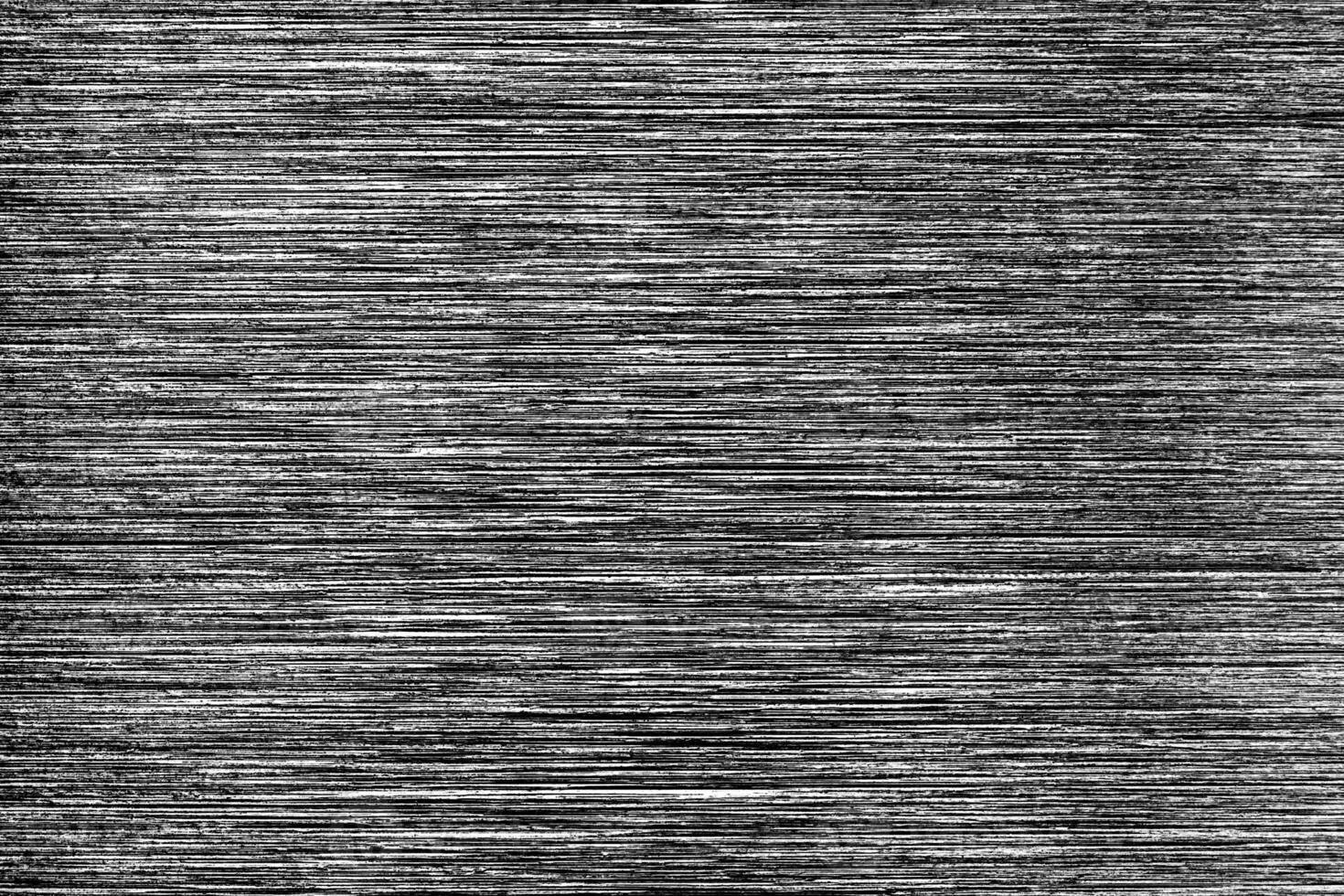 Metal texture with white scratches. Abstract noise black background overlay for design. photo