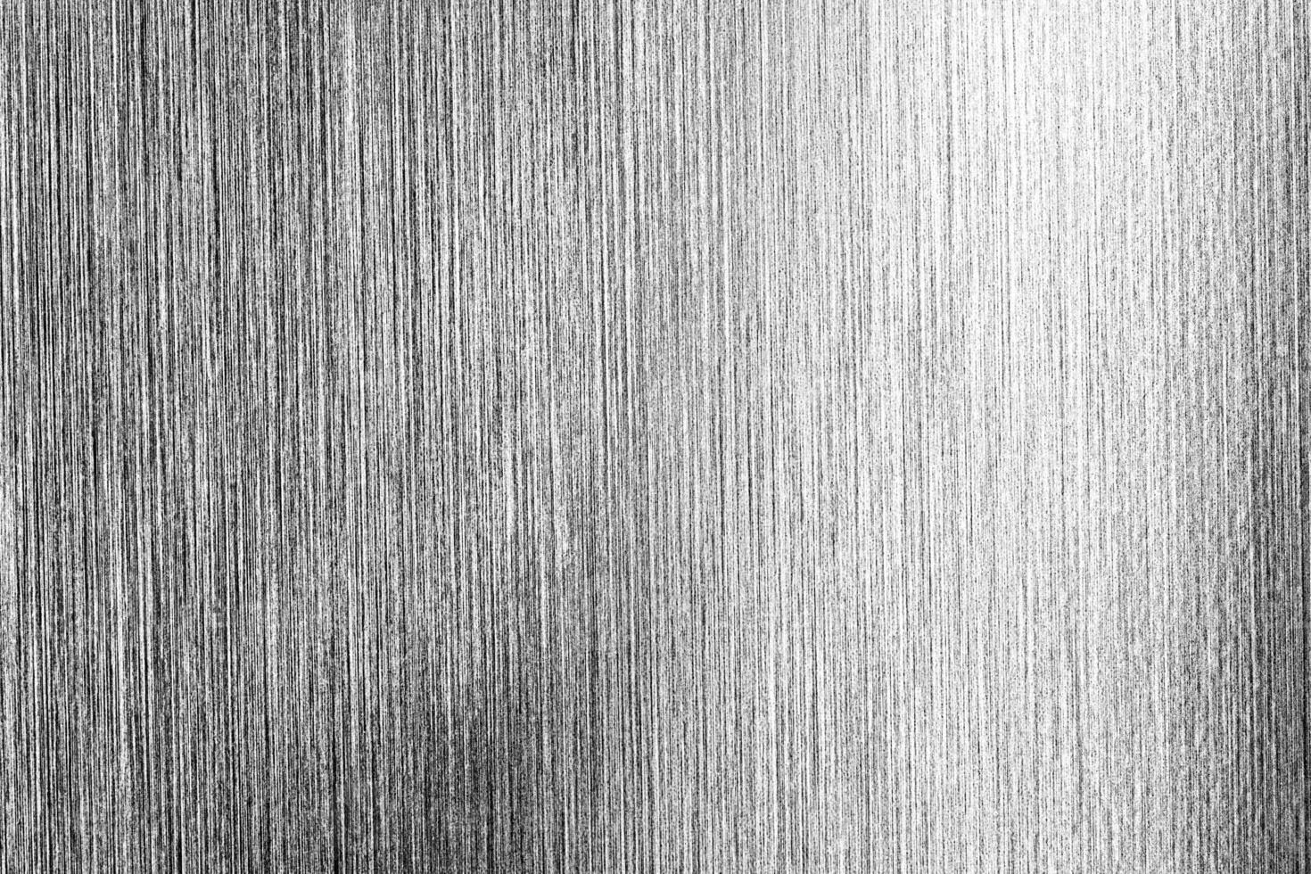 Metal texture with white scratches. Abstract noise black background overlay for design. photo
