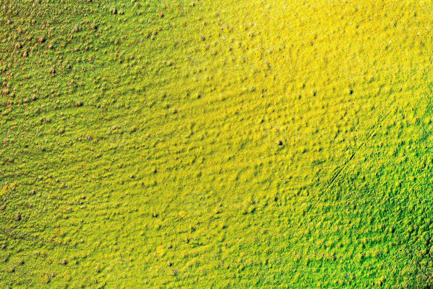 Fragment of colored graffiti painted on a wall. Bright abstract background. photo