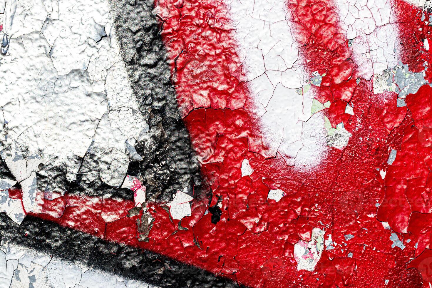 Fragment of colored graffiti painted on a wall. Bright abstract background. photo
