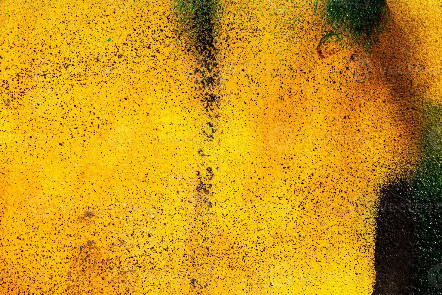 Fragment of colored graffiti painted on a wall. Bright abstract background. photo