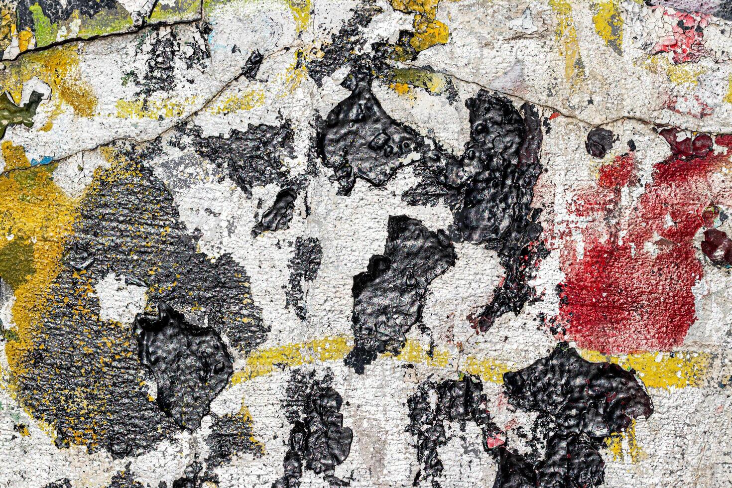Fragment of colored graffiti painted on a wall. Bright abstract background. photo