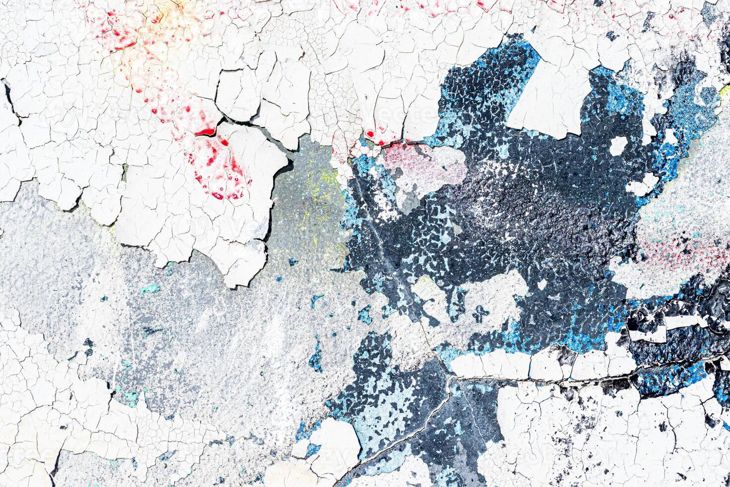 Fragment of colored graffiti painted on a wall. Bright abstract background. photo