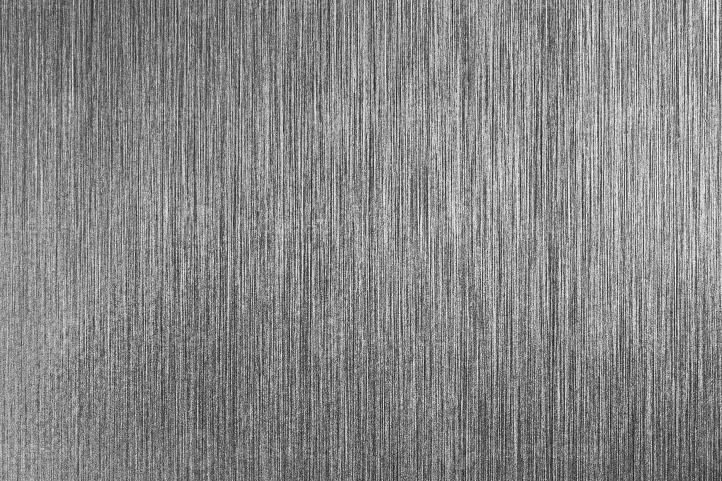 Silver metal texture with white scratches. Abstract noise black background overlay for design. photo