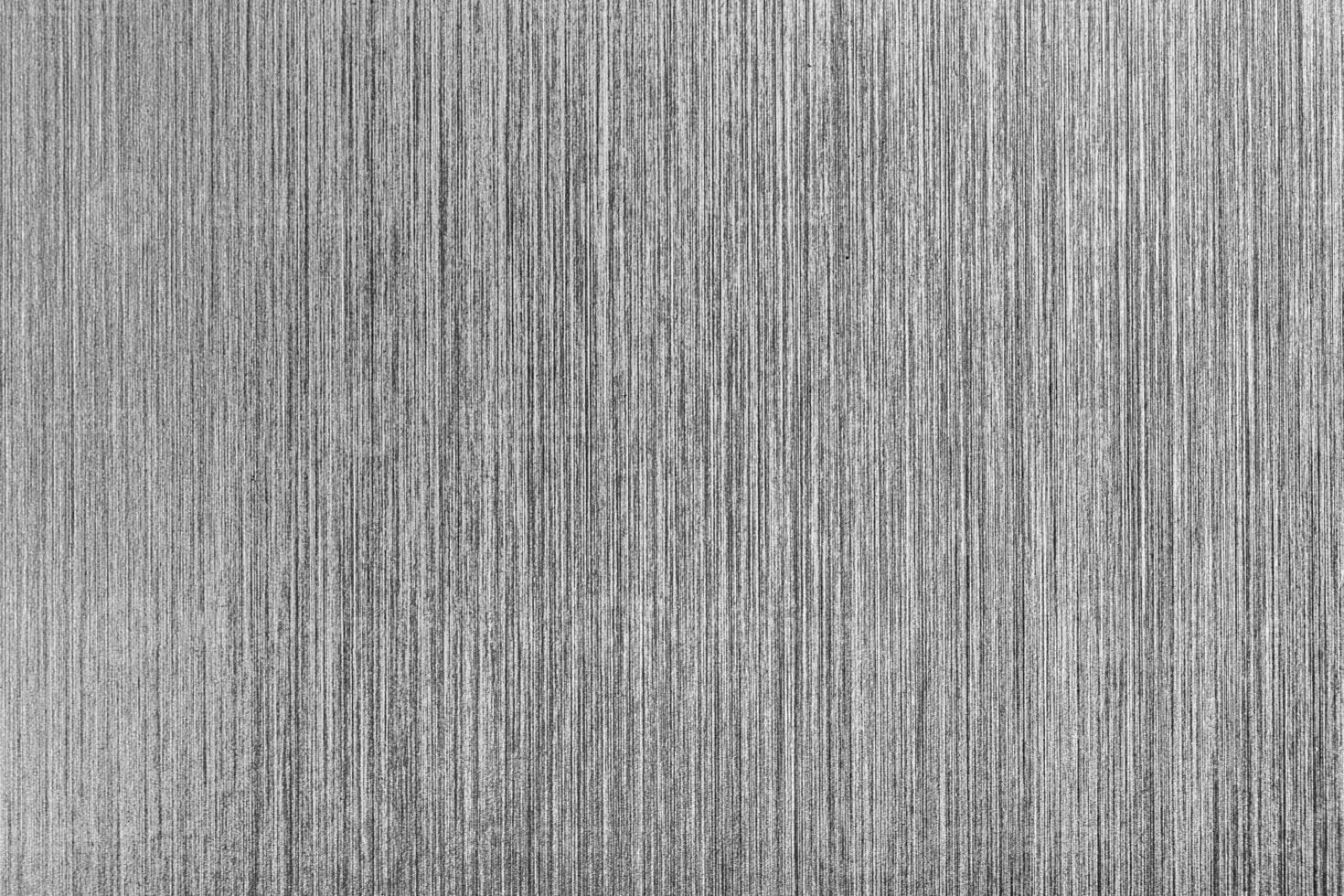 Silver metal texture with white scratches. Abstract noise black background overlay for design. photo