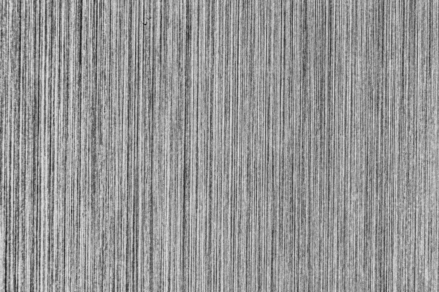 Silver metal texture with white scratches. Abstract noise black background overlay for design. photo