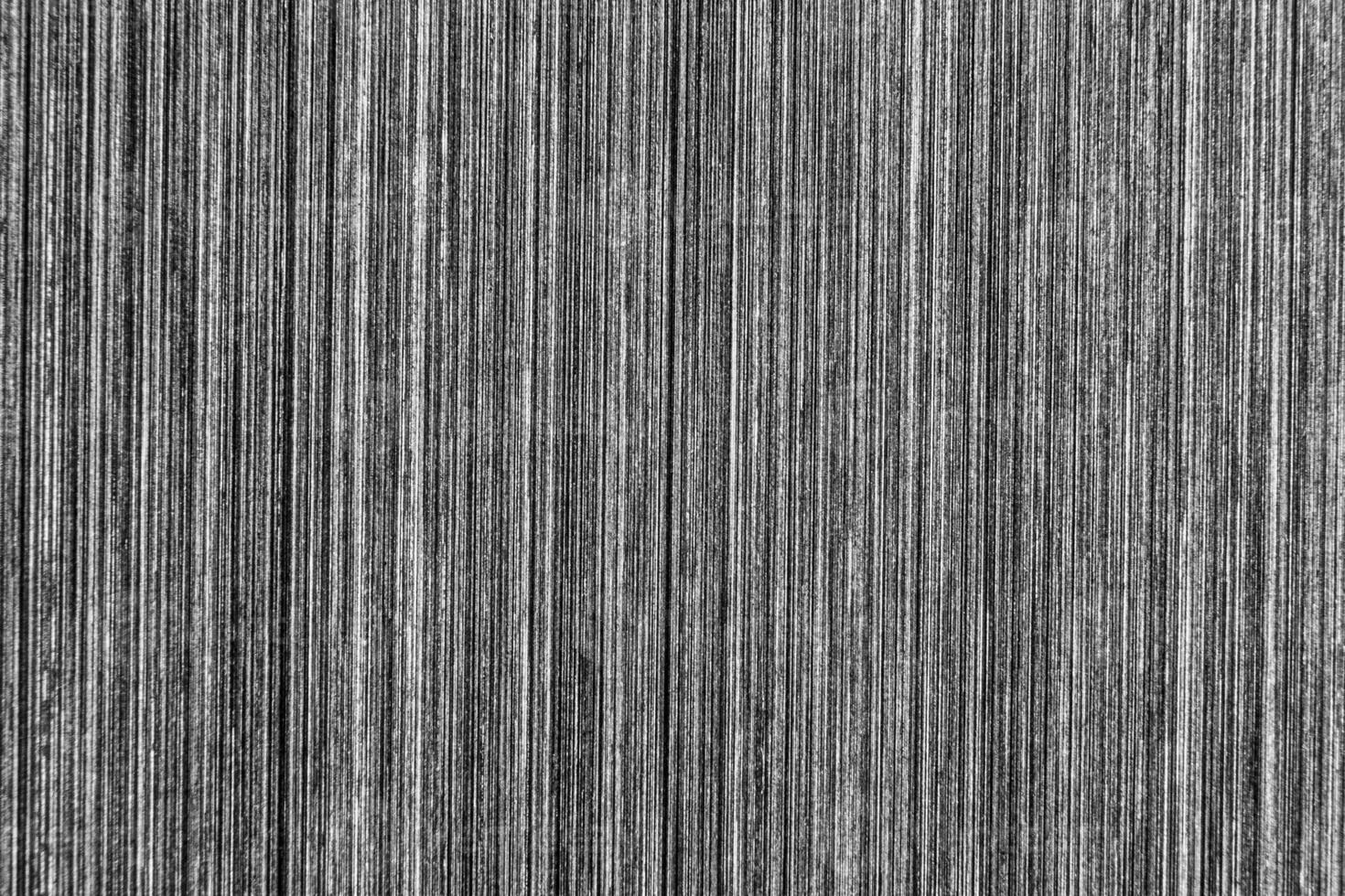 Silver metal texture with white scratches. Abstract noise black background overlay for design. photo