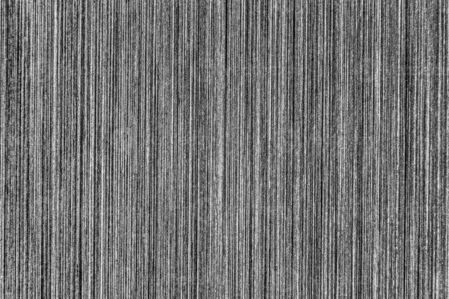 Silver metal texture with white scratches. Abstract noise black background overlay for design. photo