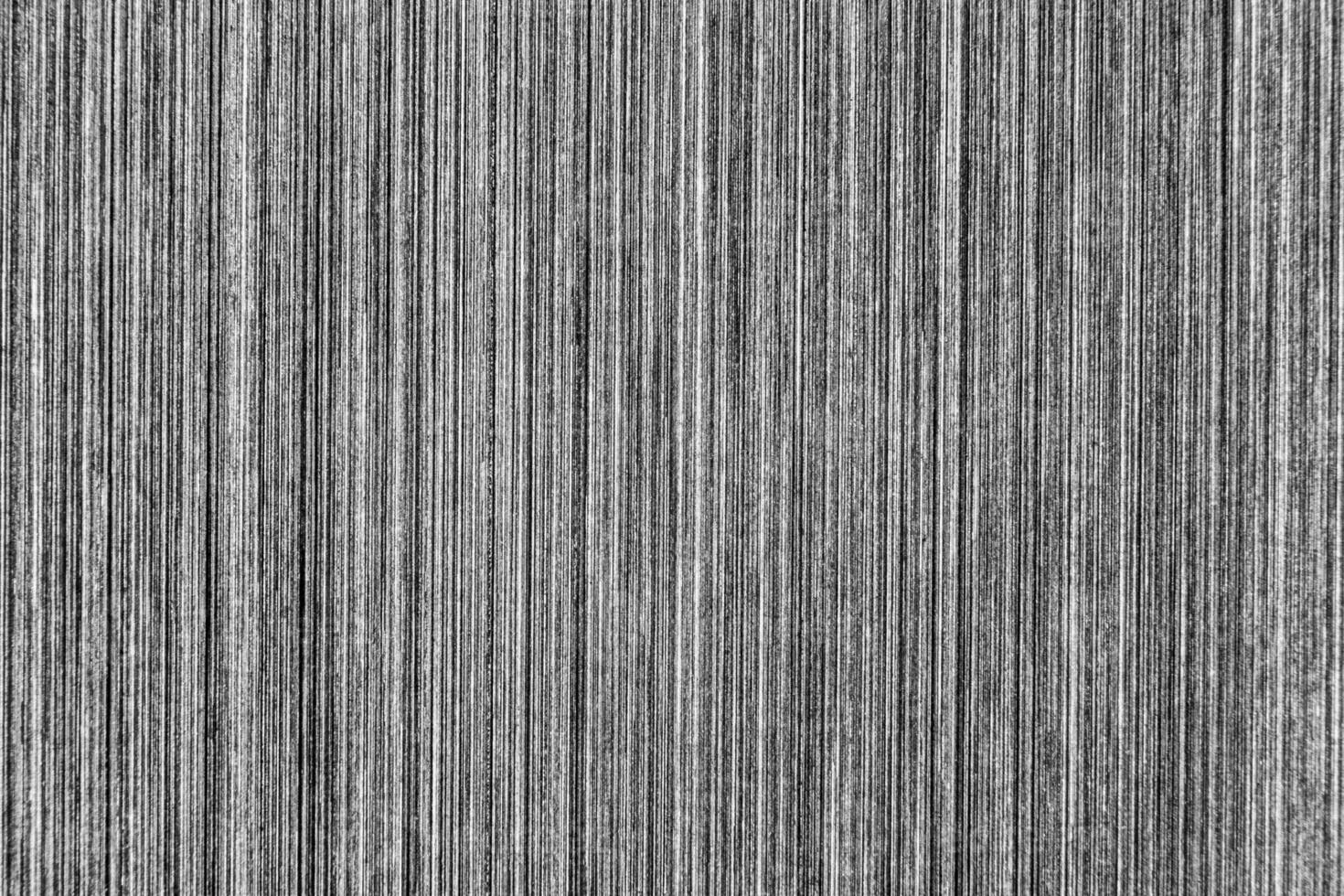 Silver metal texture with white scratches. Abstract noise black background overlay for design. photo