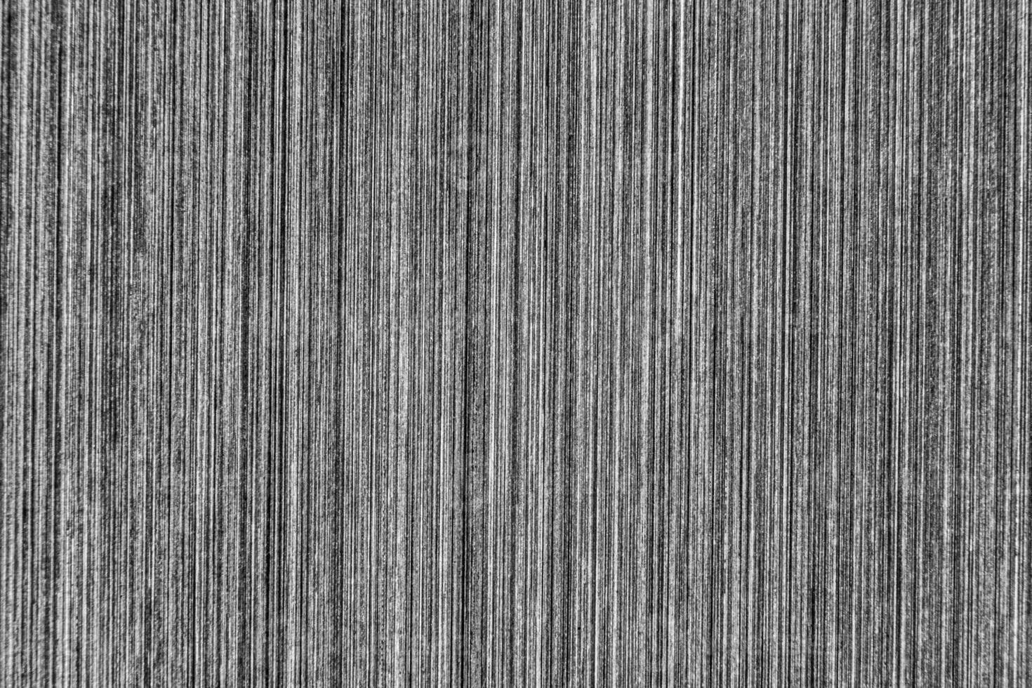 Silver metal texture with white scratches. Abstract noise black background overlay for design. photo