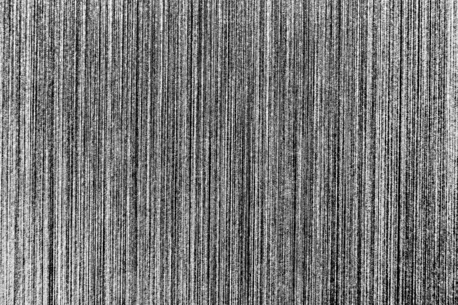 Silver metal texture with white scratches. Abstract noise black background overlay for design. photo