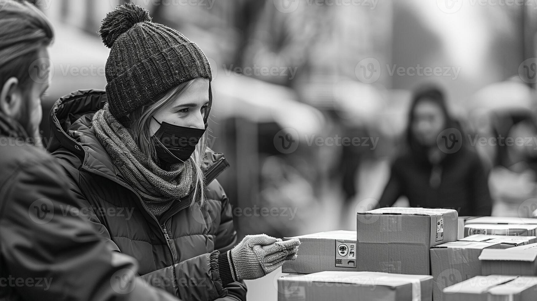 A person assisting with meal distribution to those in need. photo