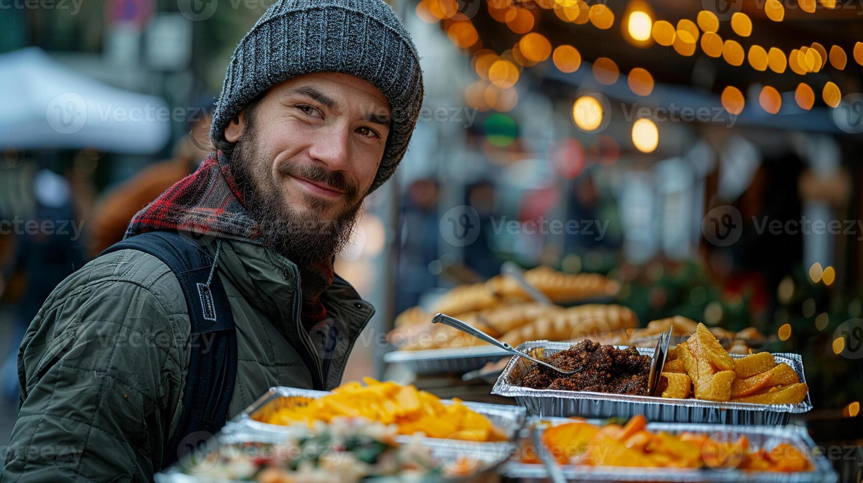 A person assisting with meal distribution to those in need. photo