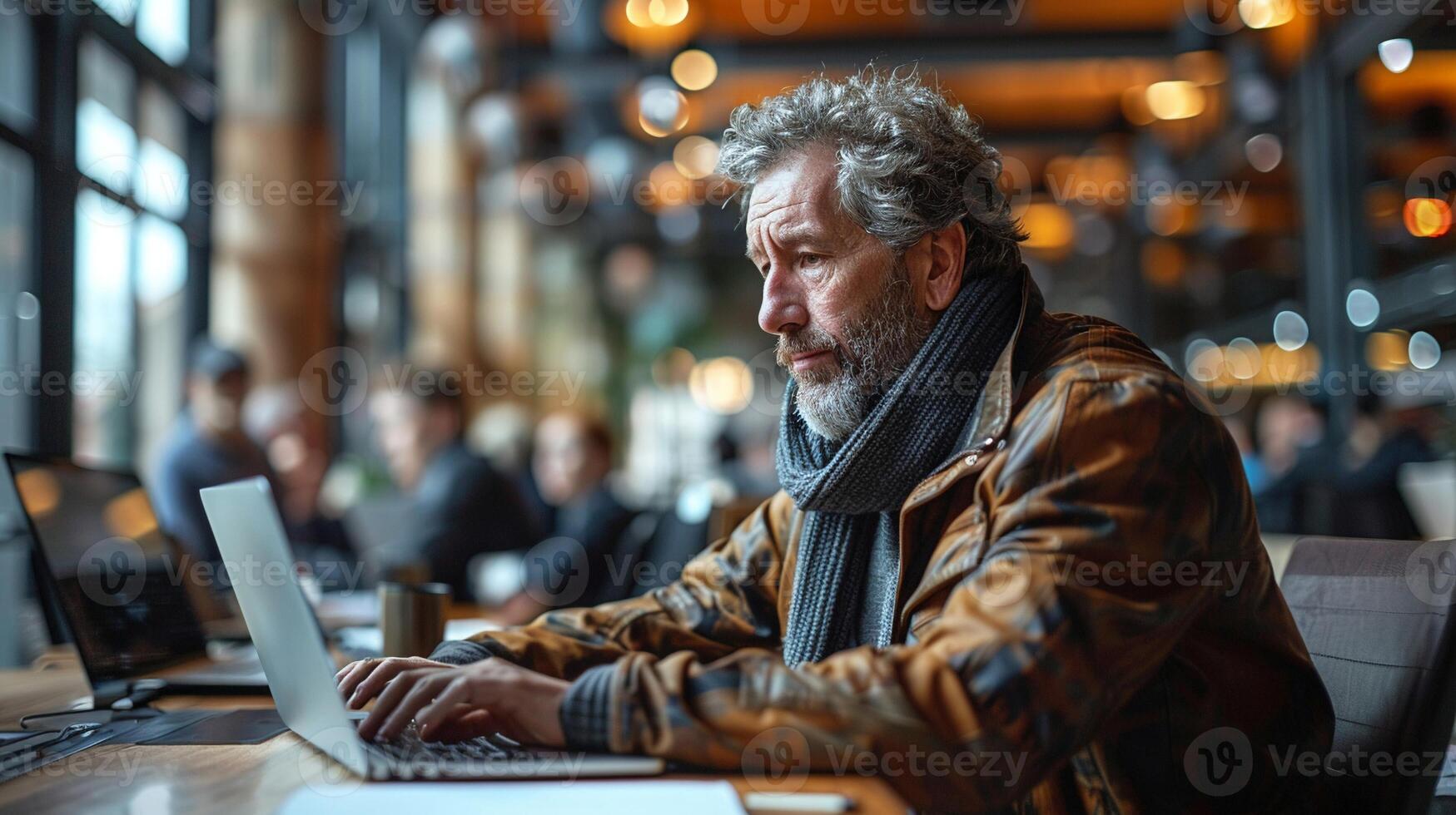 A person with a hearing impairment using sign language in a meeting. photo
