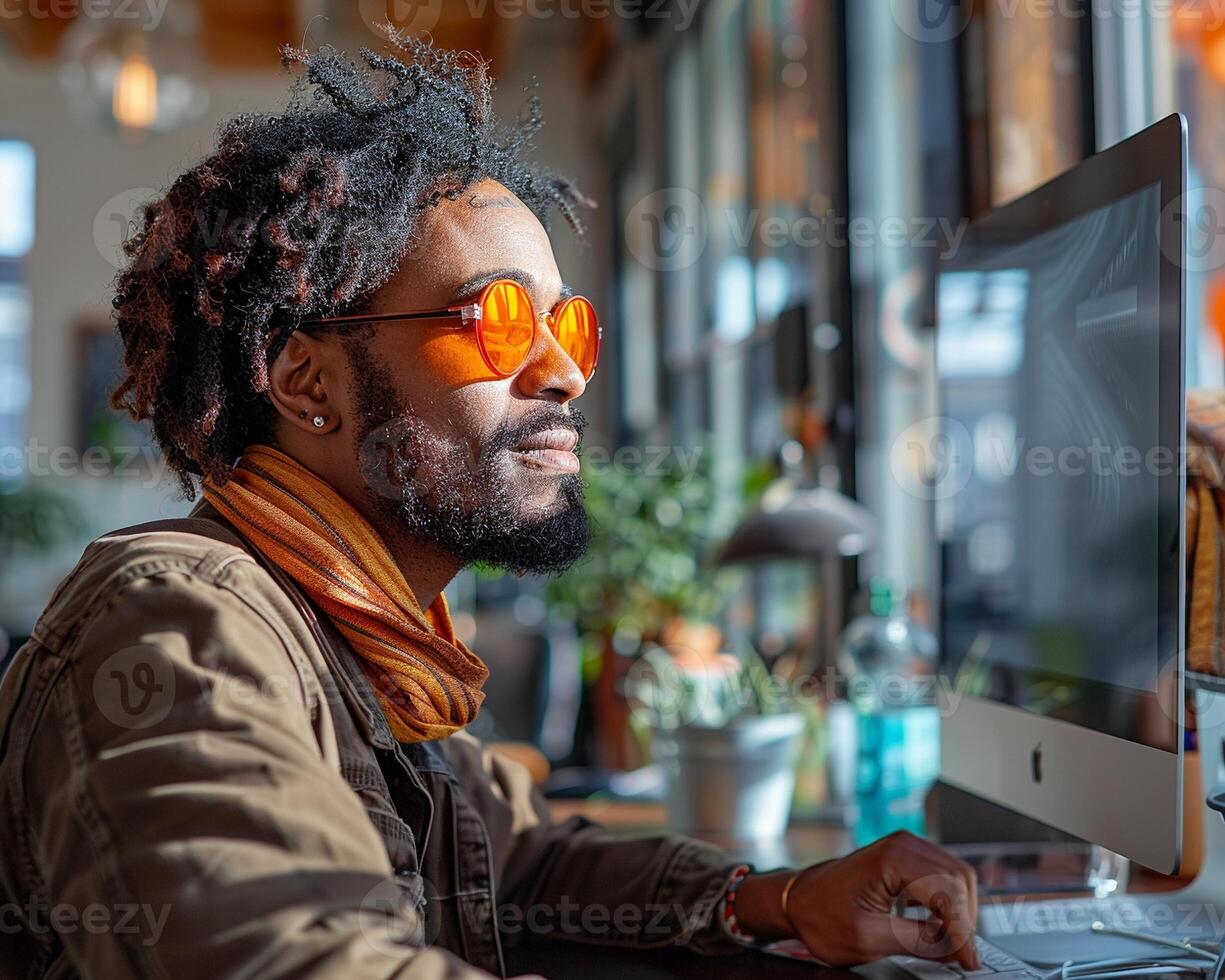 A person with a visual impairment using a computer inclusion at work photo