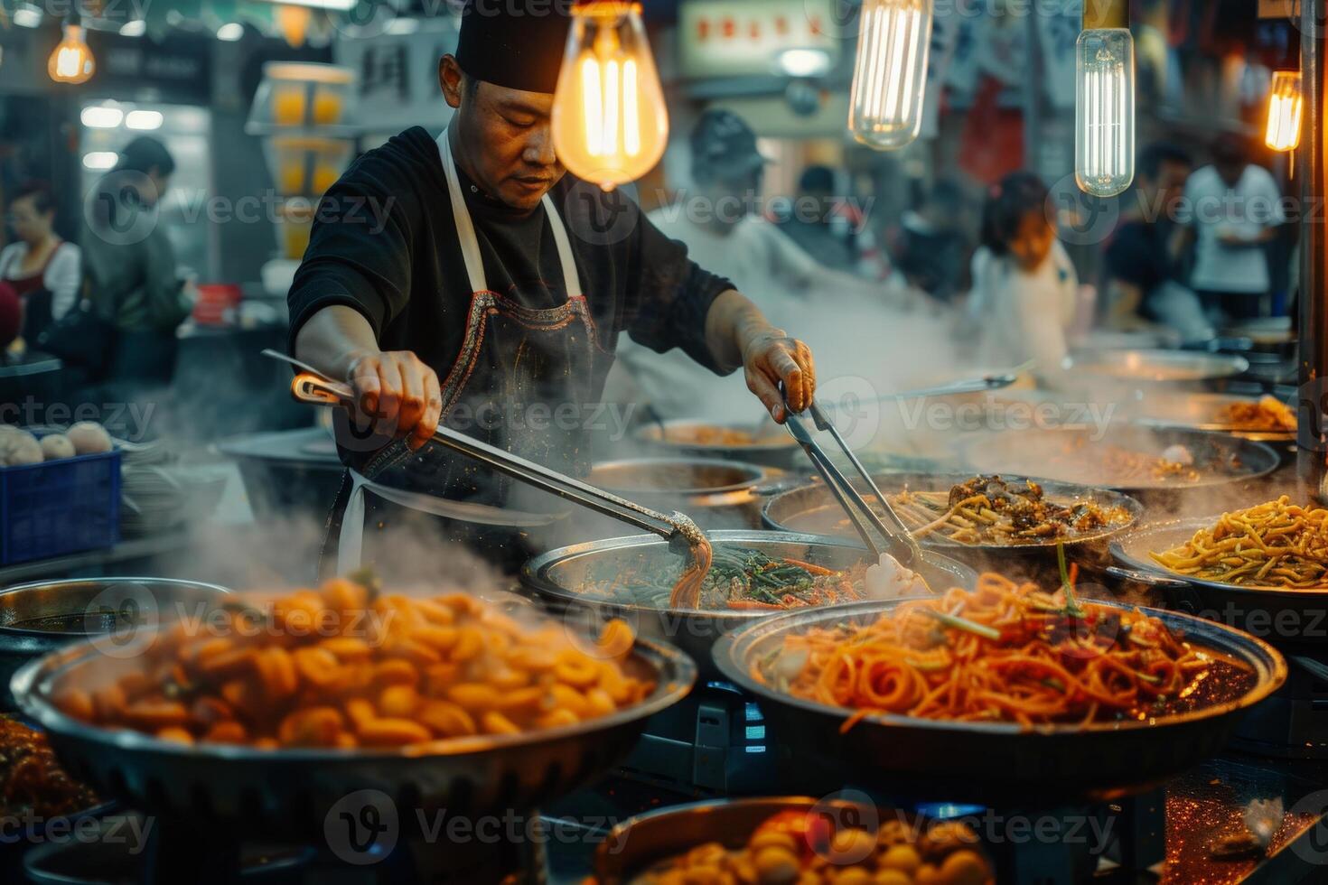 A man wearing an apron is preparing food at a market photo