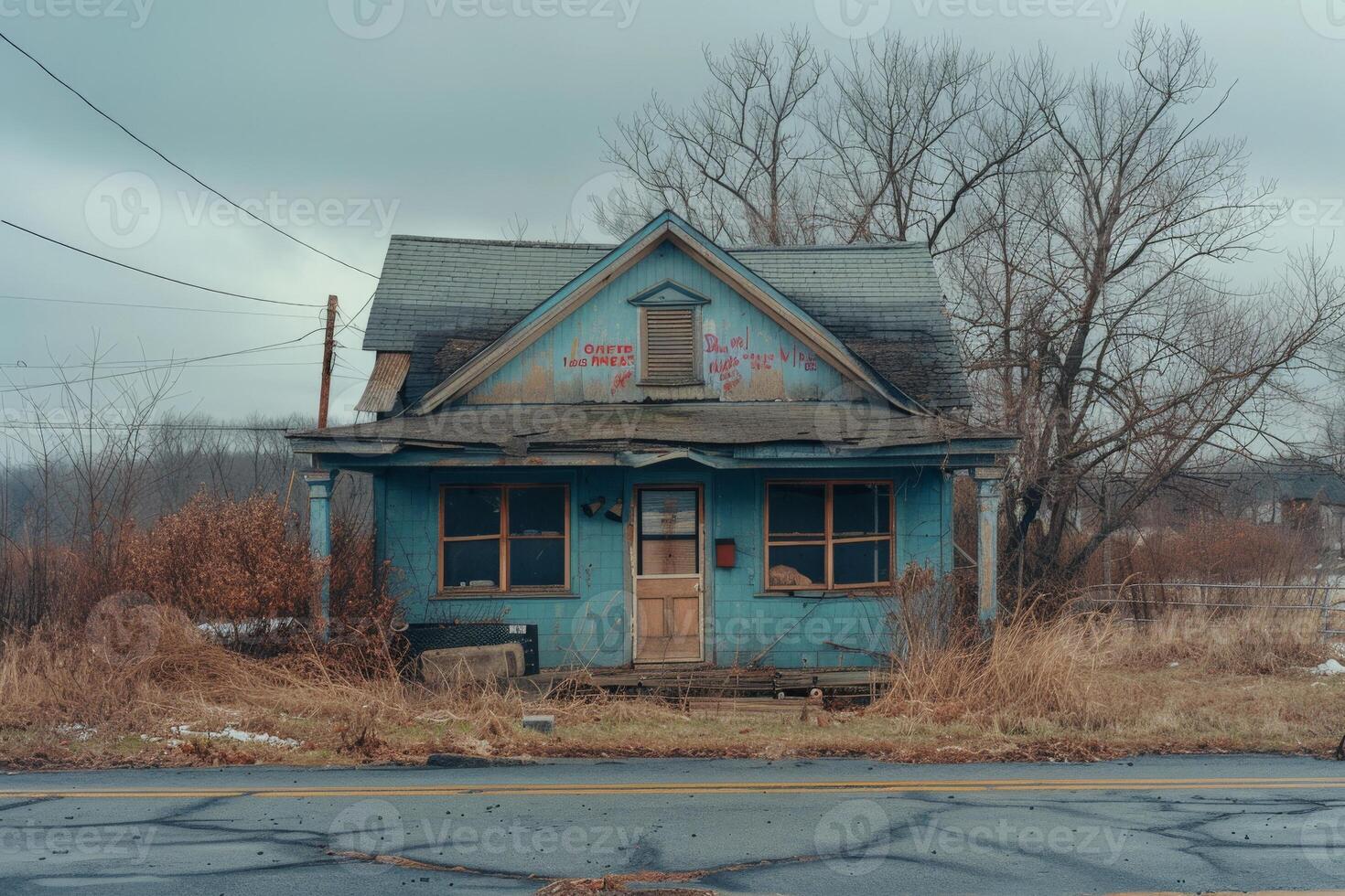 A blue house with graffiti saying im sorry im sorry photo