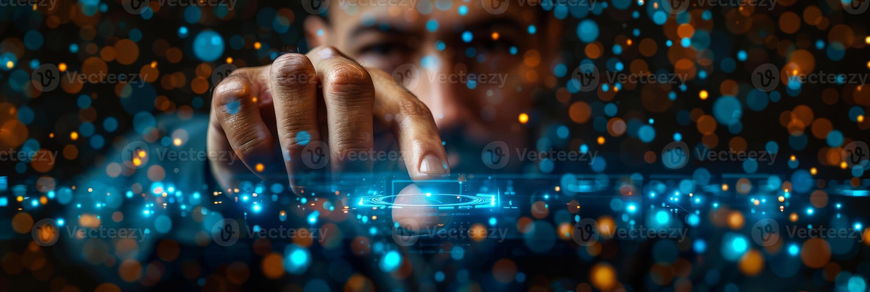 A man is interacting with a hightech screen using his finger photo