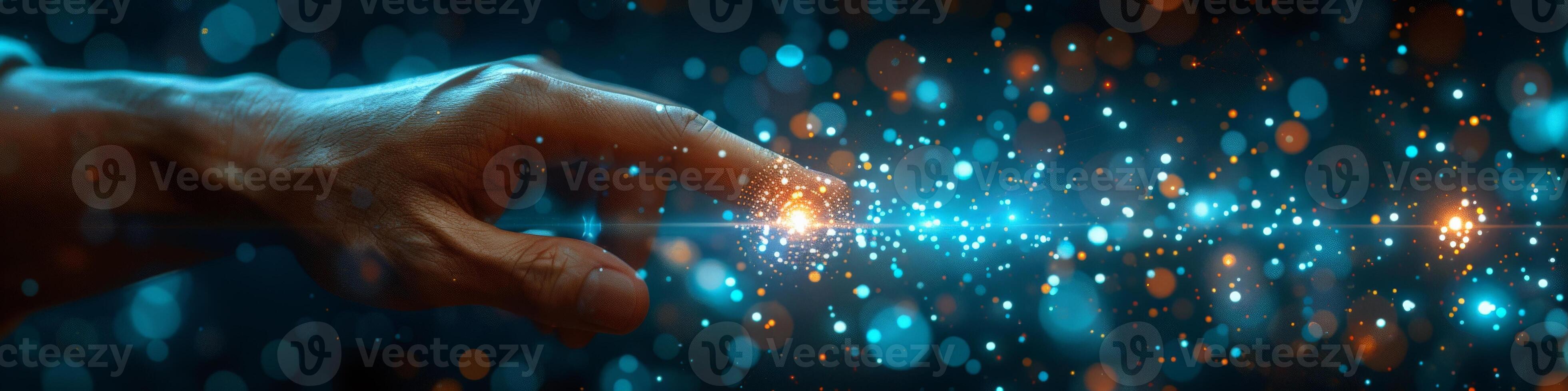 In the image, a hand is extending towards a luminous light source photo