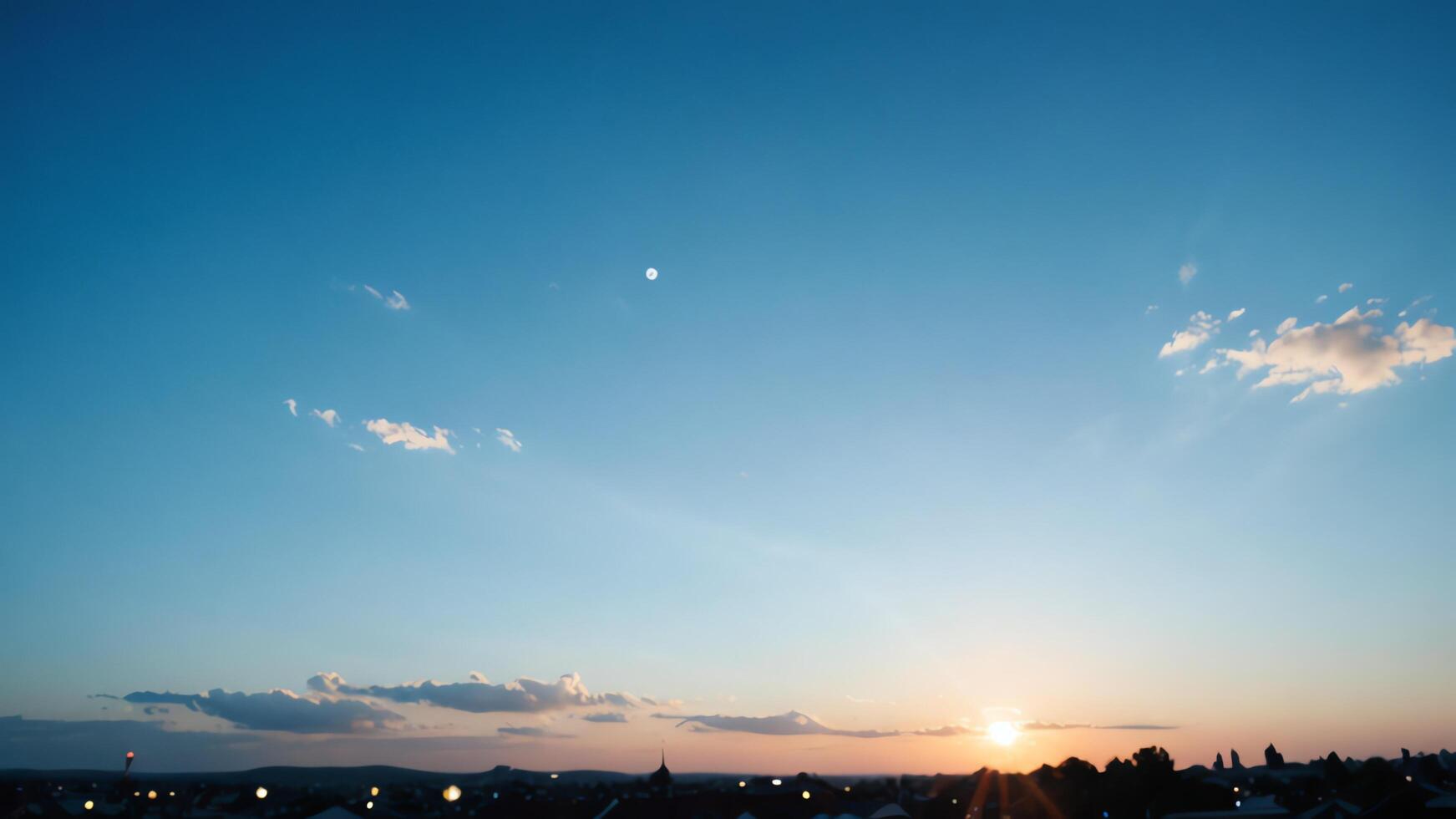 a view of the sky with clouds and sun photo
