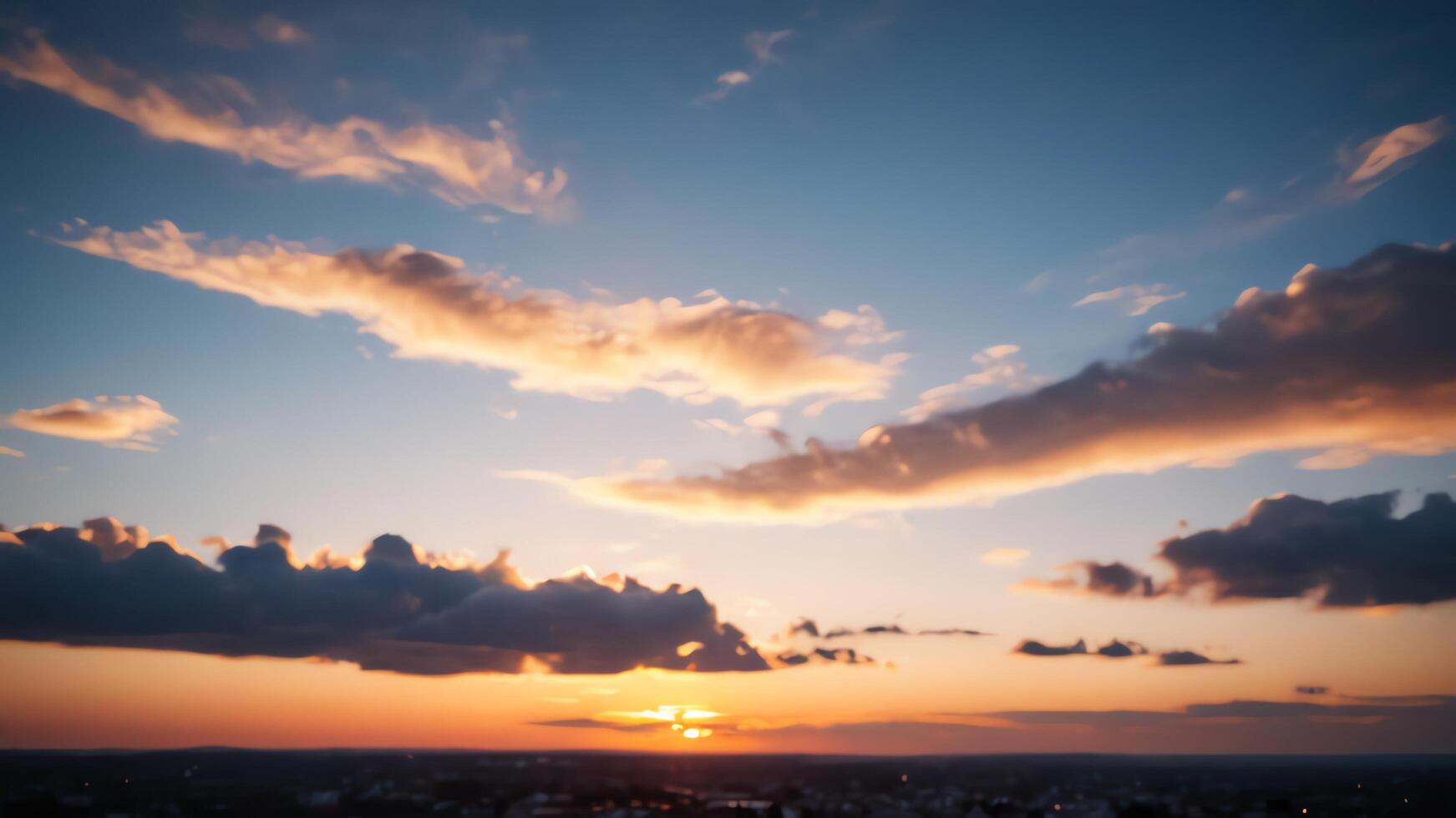 view of the sky with the orange light of the sun photo