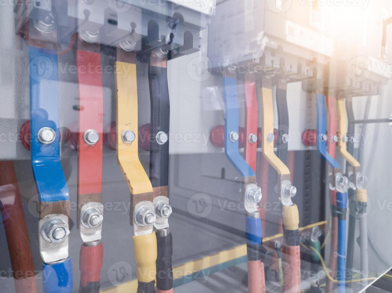 Installation of power line on main breaker panel for industrial power control. photo