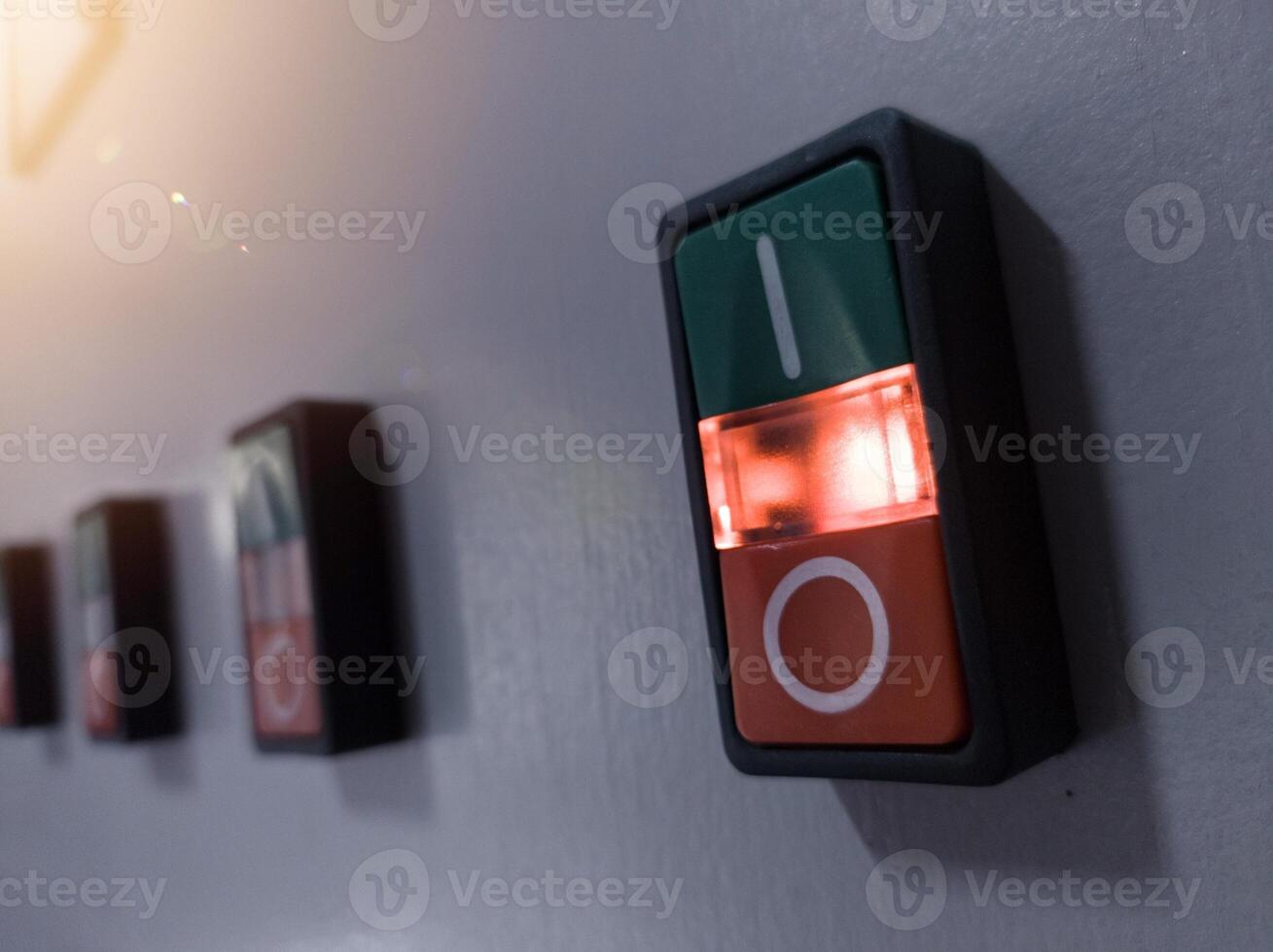 ON-OFF Switches with indicator light on in electrical panel control. photo