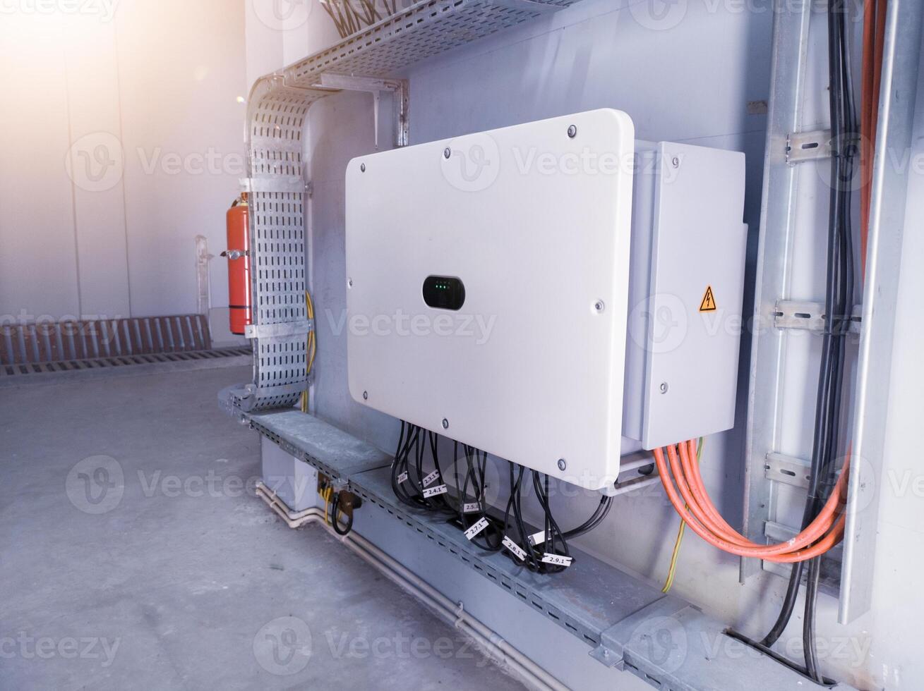 Instalation control of inverters solar panel on the wall. Technology of solar energy with shiny light. photo