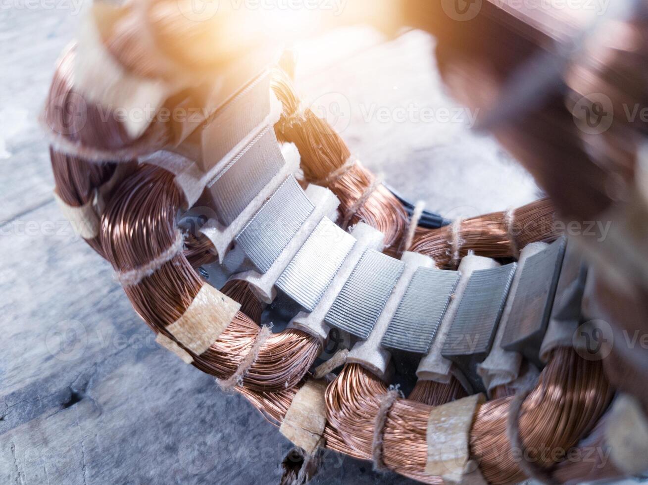 Electric motor winding coil , three phase induction motor winding coil assembly, procedure for replacing.With shiny light. photo