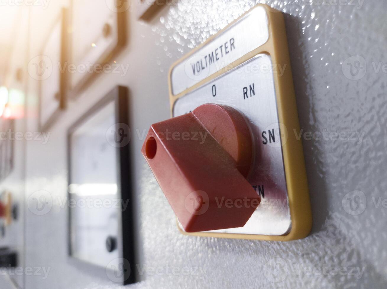 Close up Selector switch for controling voltage measurment in electrical panel industry. photo